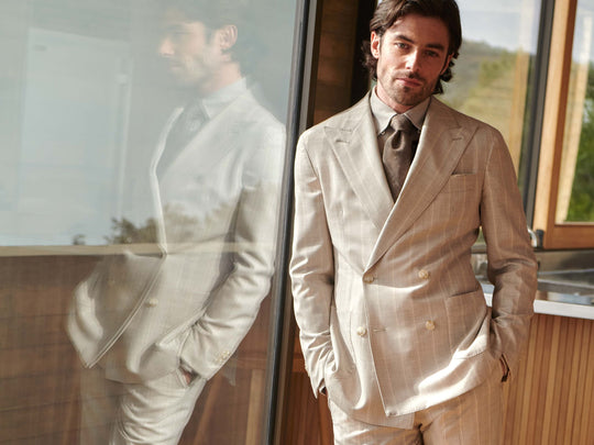 The Art of Seasonal Suiting: Mastering Fabrics for Summer & Winter Style
