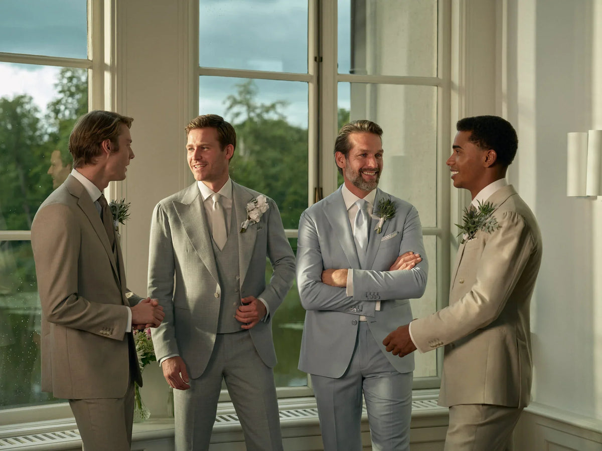 Groomsmen in four different custom suits