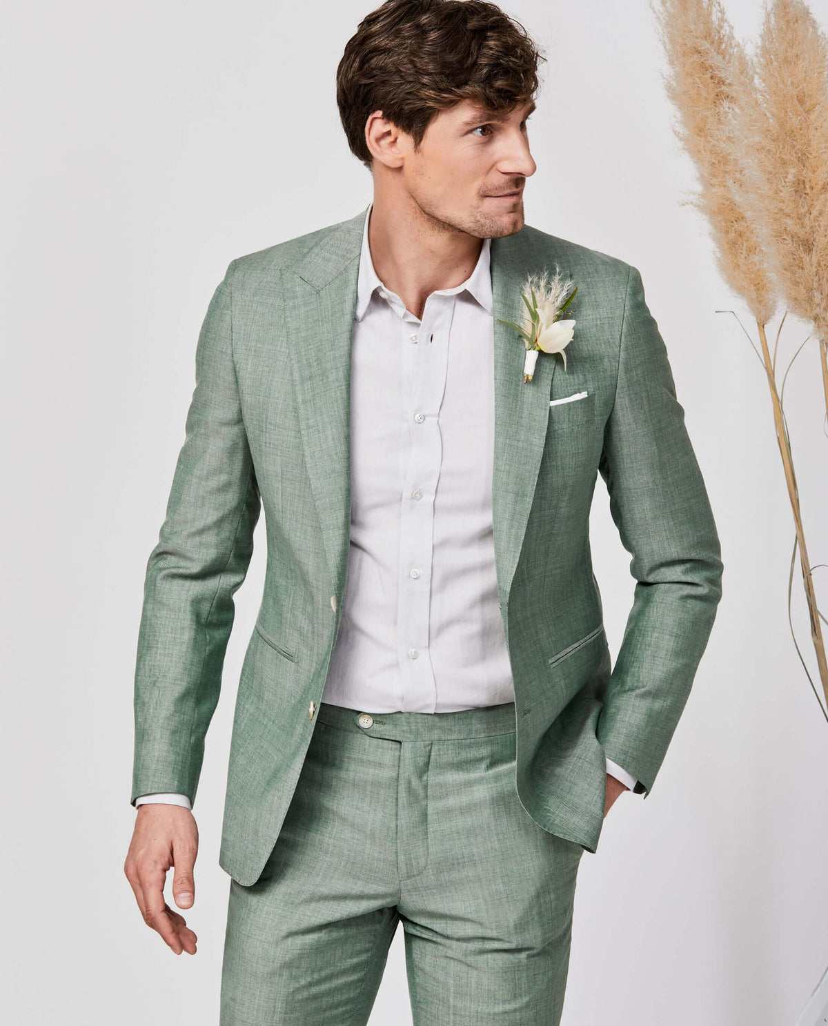 Green fancy peak lapel wool suit