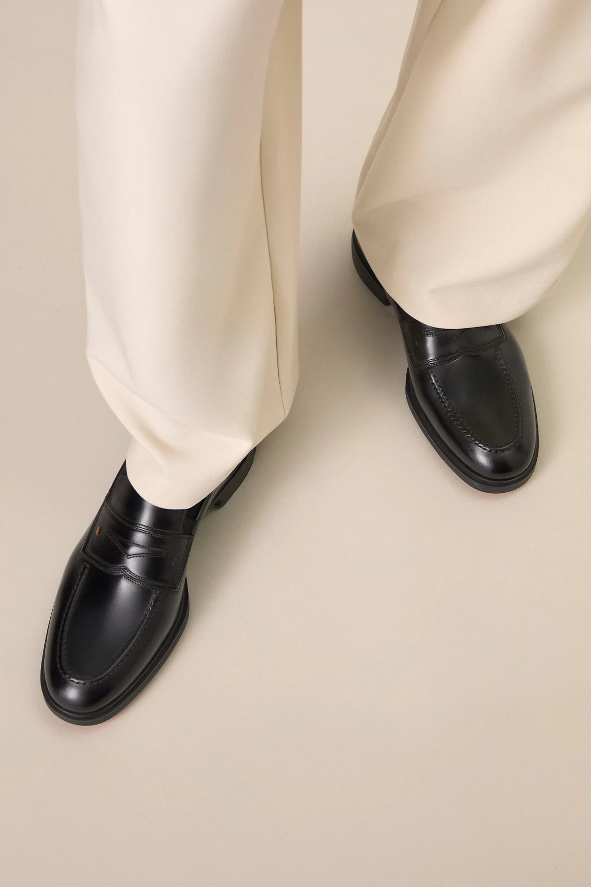 Santoni loafers worn with tailored trousers