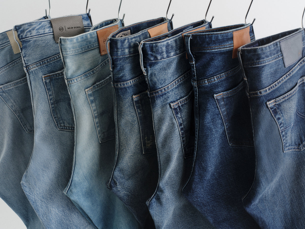 AG Jeans laid out on a denim rail