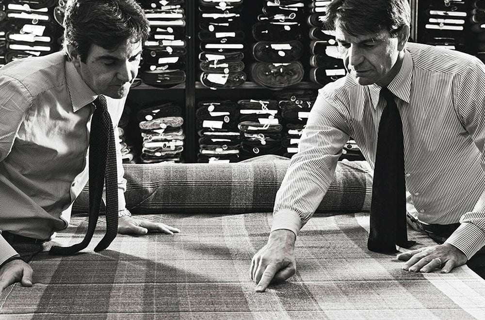 The Cesare Attolini factory with cloth on the table ready to cut