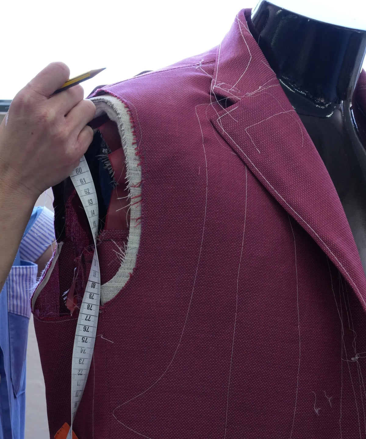 Basted full-canvas jacket on a tailor form