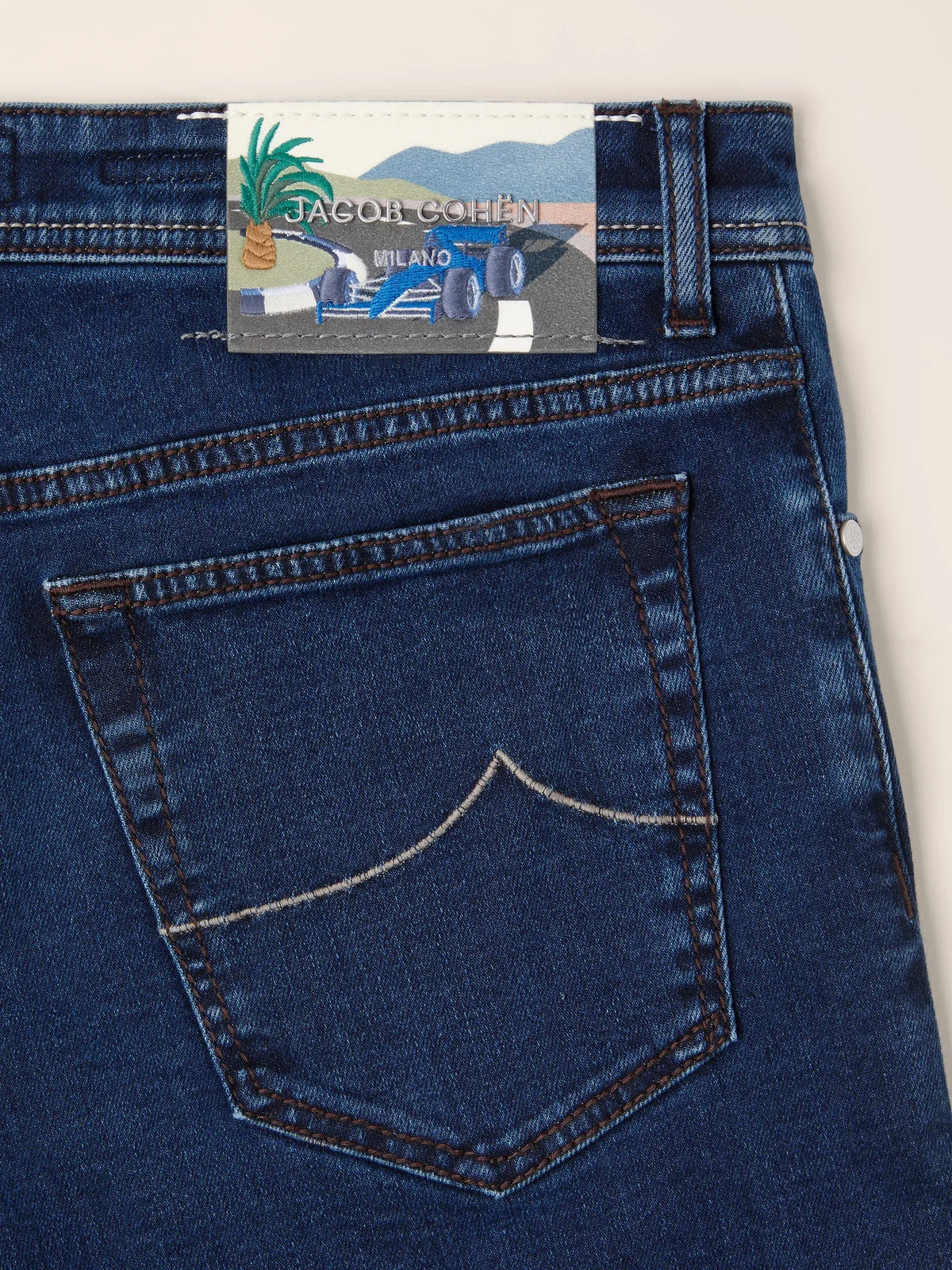 blue race car patch jeans