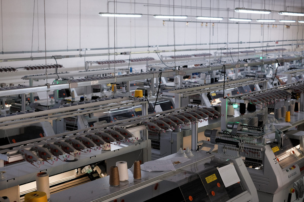 Kangra knitting machines on a factory floor