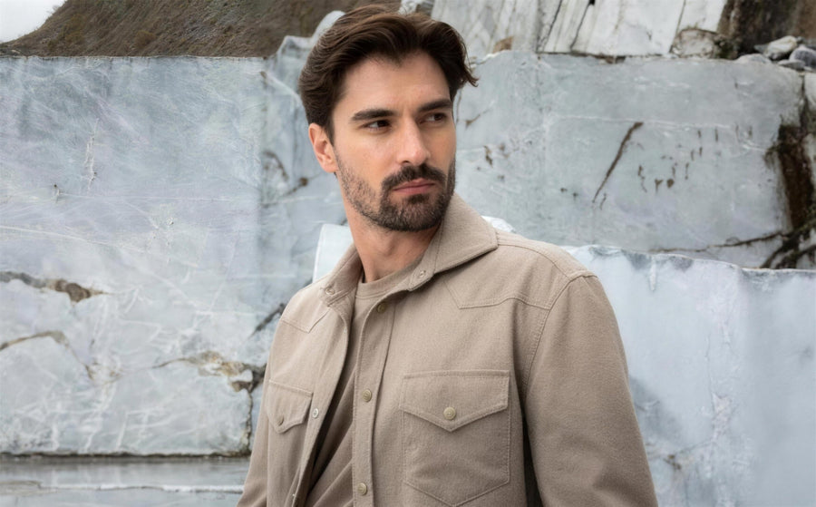 Man in a beige Marco Pescarolo overshirt at a marble quarry