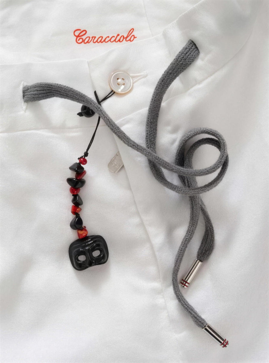 Marco Pescarolo Caracciolo trouser label and drawstring detail