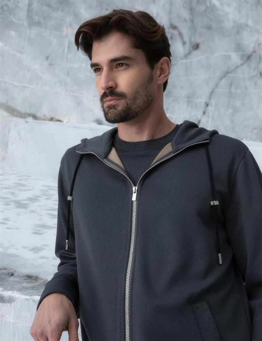 Man in a grey Marco Pescarolo zip hoodie