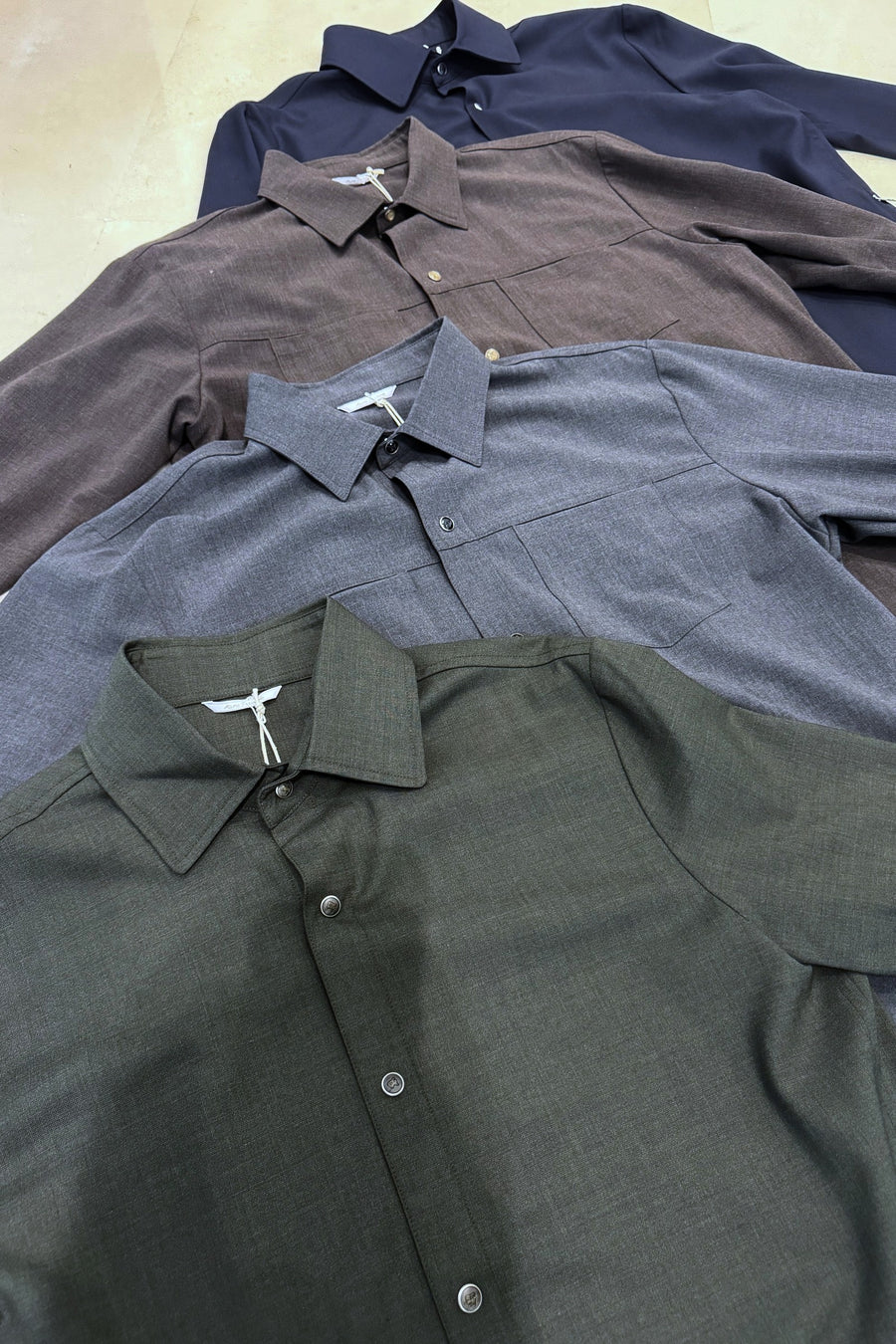 Marco Pescarolo snap-front shirts in olive, grey, brown and navy