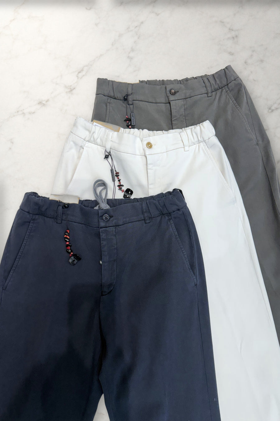 Marco Pescarolo Manu trousers in navy, ivory and grey on white marble