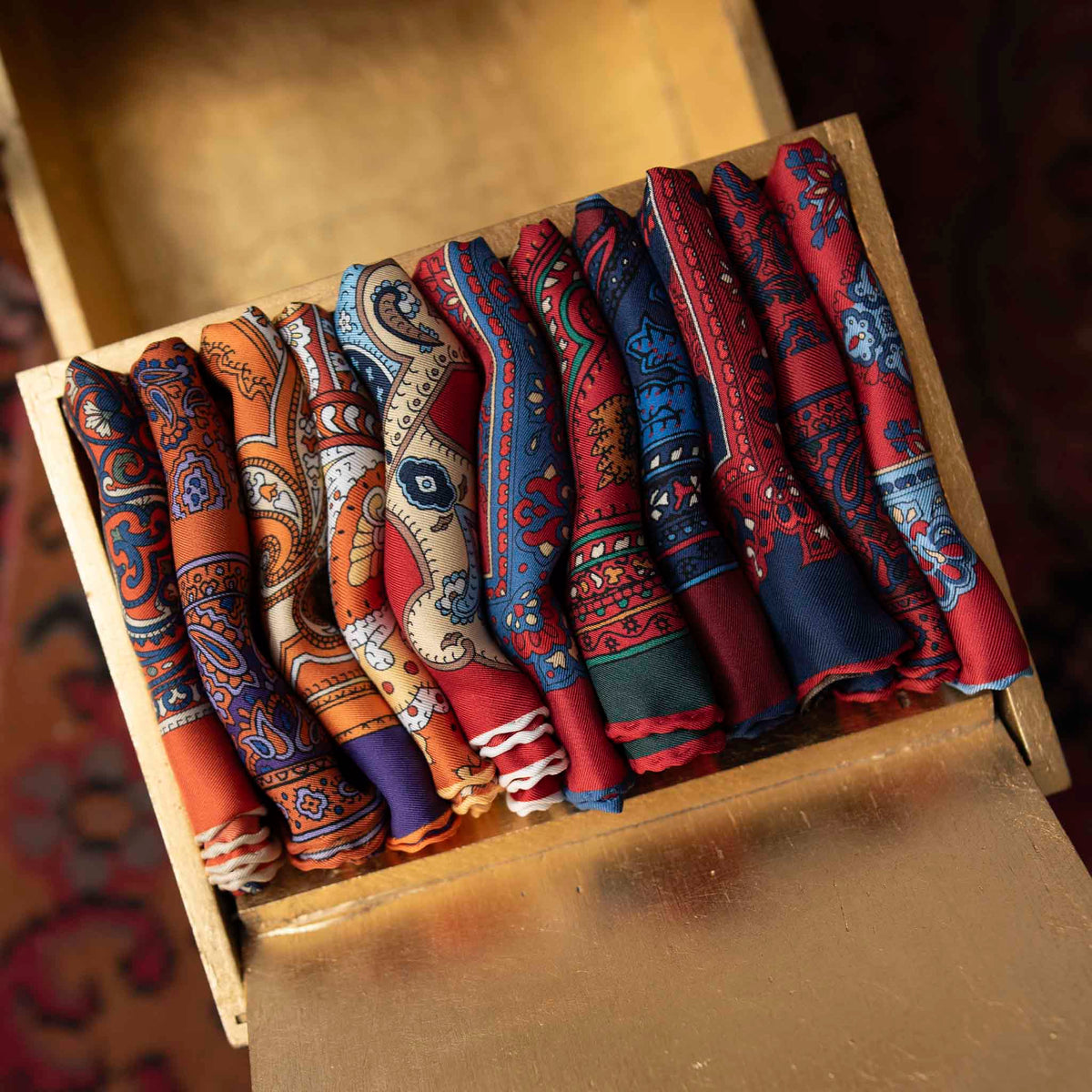 Sera Fine Silk pocket squares in a wooden box