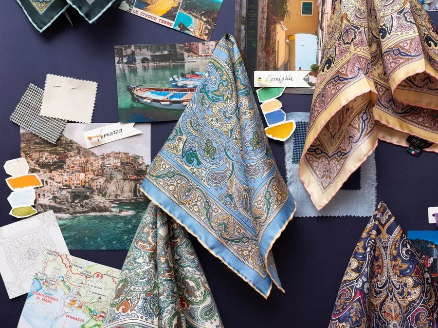 Silk pocket squares and scarves on a mood board