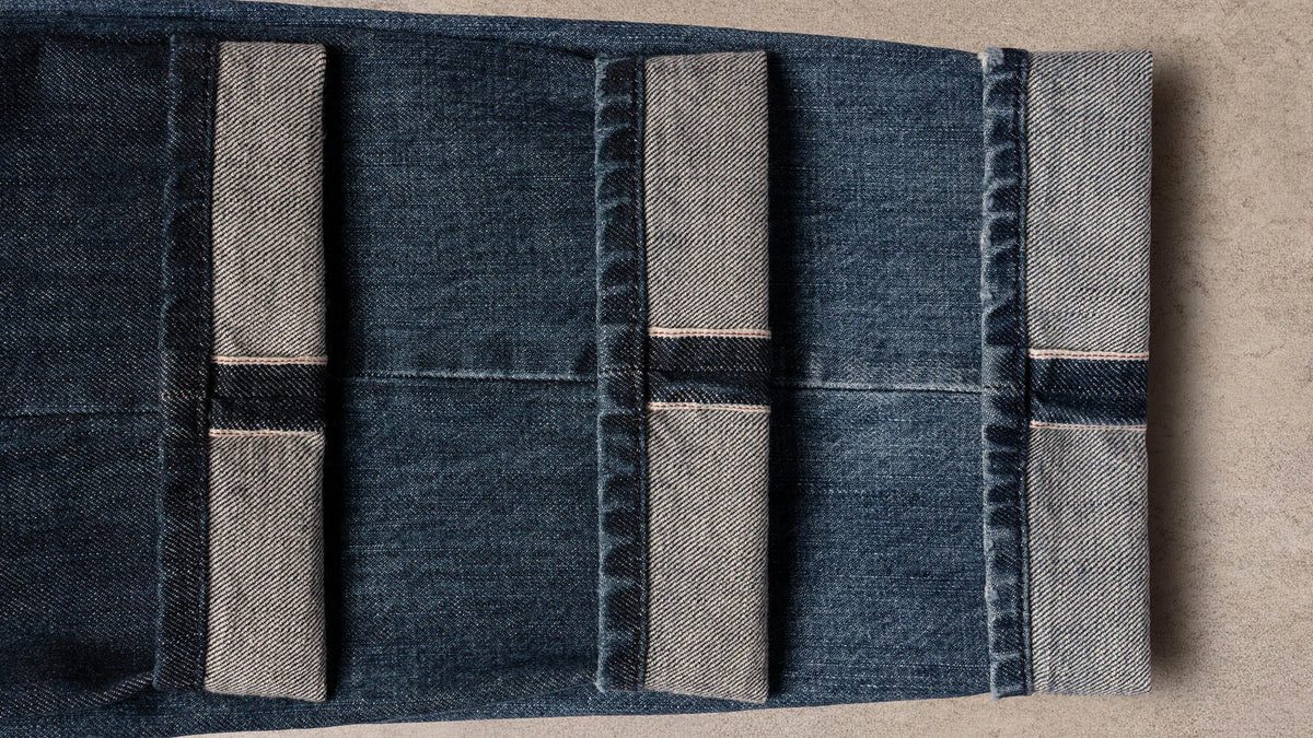 Tramarossa selvedge jeans cuffs laid side by side